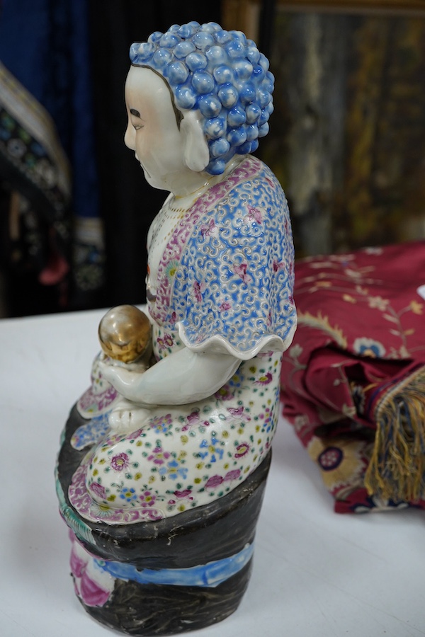 A Chinese famille rose figure of Buddha, Republic period, 30cm